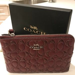 Gorgeous NWT wine colored Coach wristlet